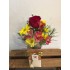Jarra cartonada com flores