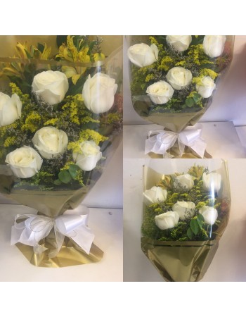 Buquê rosas no celofane dourado 